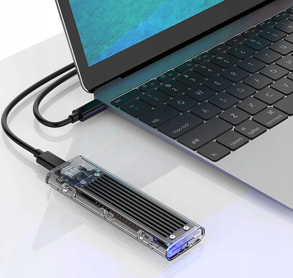 Kuti e jashtme Orico TCM2-C3, M.2 NVMe në USB-C, 10Gb/s, transparente